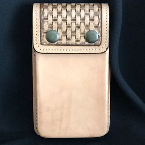 Handmade all leather cell phone carrier.